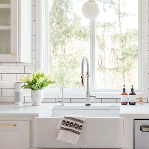 bright kitchen and white appliances from Northcraft Flooring & Design in Raytown, MO