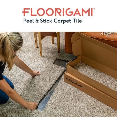 Person installing carpet tiles - Floorigami carpet from Northcraft Flooring & Design in Raytown, MO